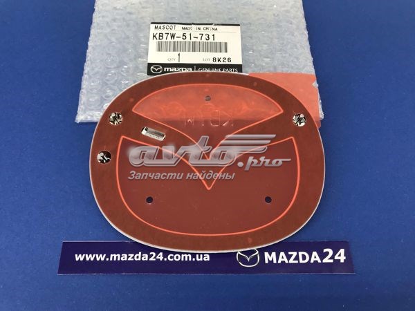Купити KB7W51731 Mazda Емблема кришки багажника, фірменнийзначок