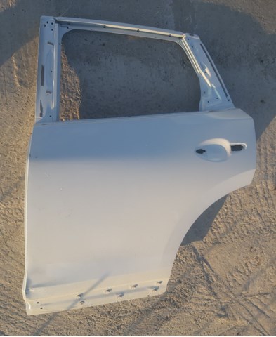 Двері задні, ліві K1Y07302XE Mazda