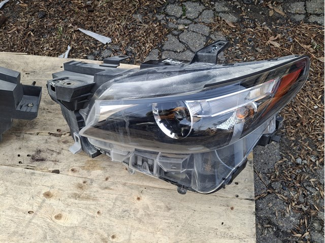 Фара ліва TM52510L0D Mazda