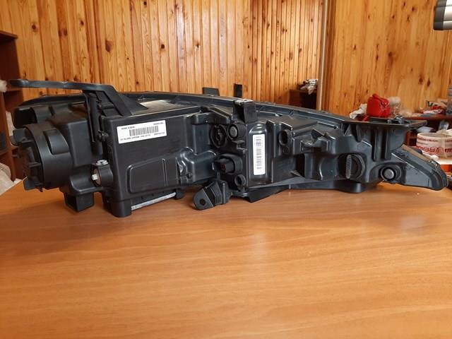 Фара Chrysler 68110249AE