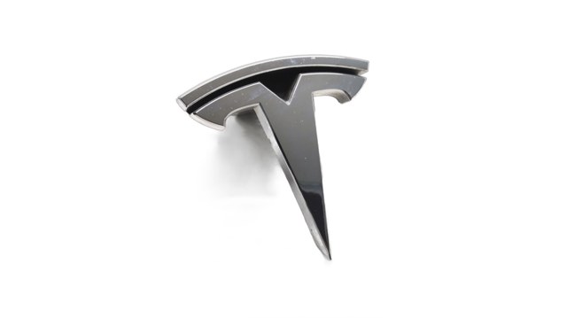 Купити 104788400D Tesla Емблема решітки радіатора