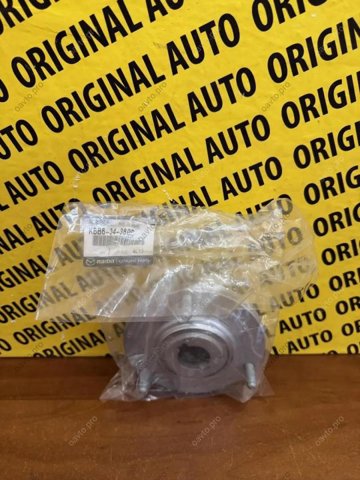 KBB634380B Mazda Кріплення переднього амортизатора