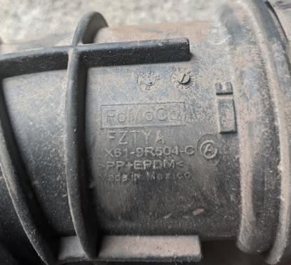 Купити JX6Z9B659A Ford Патрубок повітряний, вихід повітряного фільтра