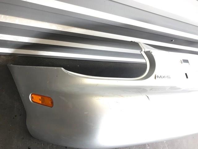 Купити NC1050221 Mazda Задній бампер
