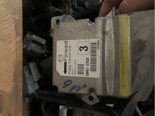 Модуль-процесор керування подушки безпеки GMN357K30 Mazda