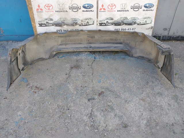 Задній бампер 57704SA010 Subaru
