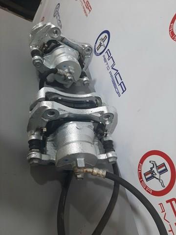 Купити 410015RB0A Nissan/Infiniti Супорт гальмівний передній правий
