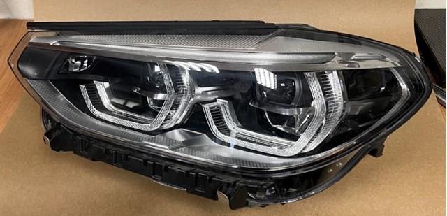 Фара ліва 8739657 BMW