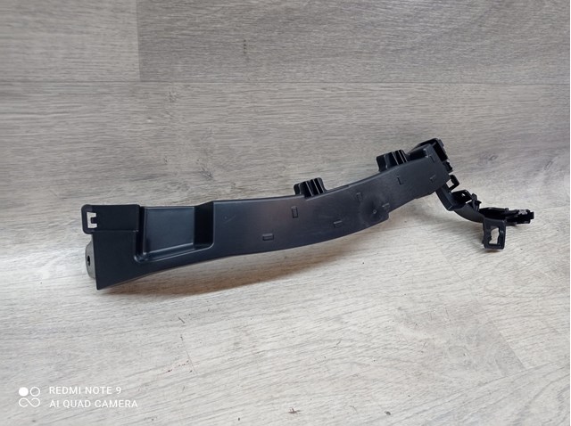 1615049480 Peugeot/Citroen Кронштейн бампера переднього, правий