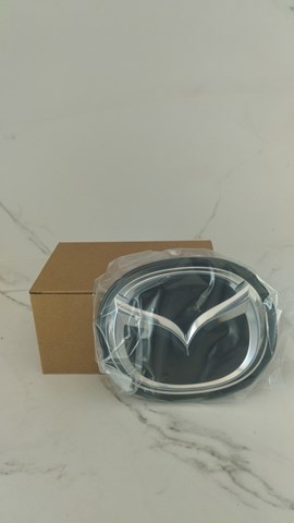 BCKB51730A Mazda Фірмовий значок решітки радіатора