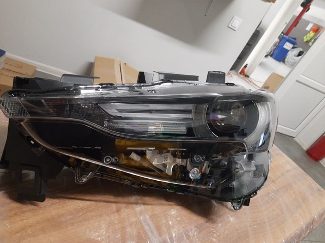 Купити KB8P51041H Mazda Основна фара в зборі ліва