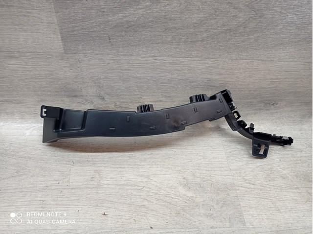 Кронштейн бампера переднього, правий 1615049480 Peugeot/Citroen