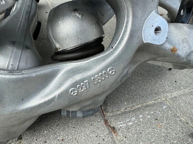 Вісь передня і поворотні кулаки Mercedes A2973320800 ціна, від 571.39 USD