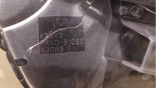 Фара передня права Mazda TK5051030
