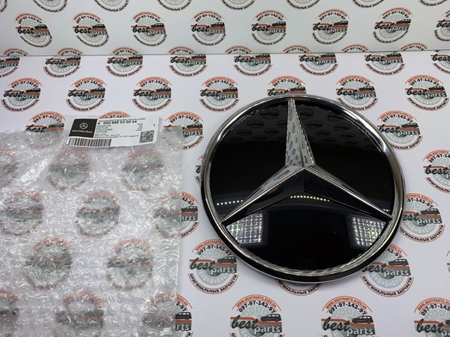 Емблема на решітку радіатора Mercedes A000880030064 ціна, від 267.37 USD