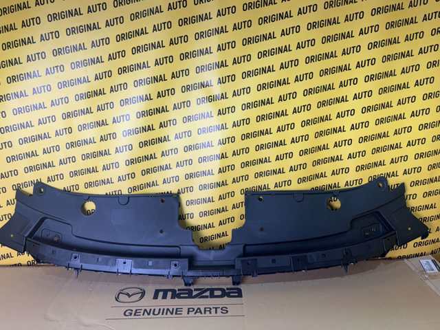 Накладка верхня передньої панелі/супорту радіатора TK4850720E Mazda
