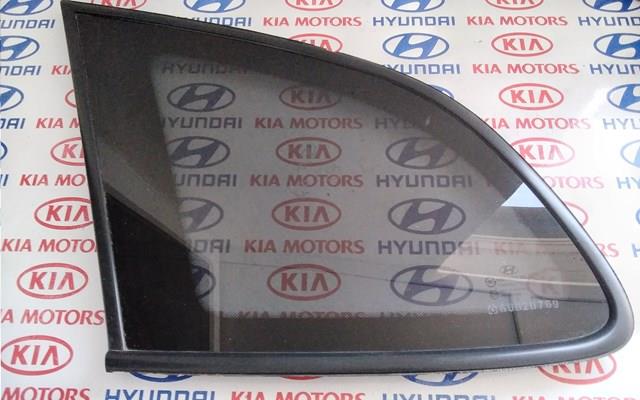 Скло багажного відсіку, ліве 878102B050 Hyundai/Kia