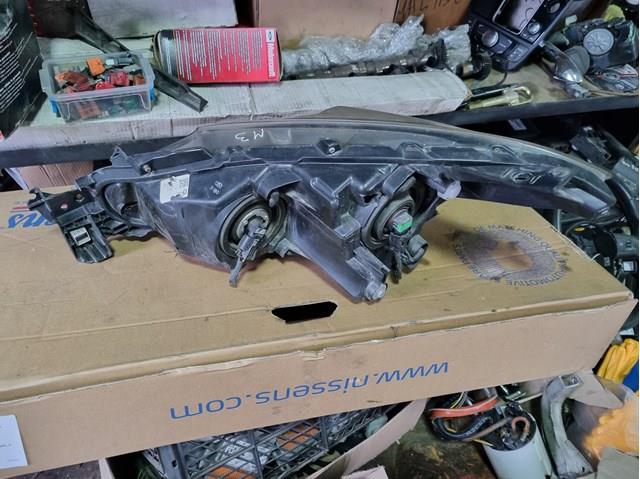 Купити BHN151030 Mazda Фара правая