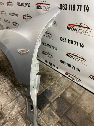 Бічна частина передня ліва Mazda GSYD52210