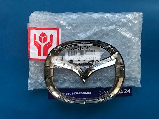 Емблема решітки радіатора D10J51730 Mazda