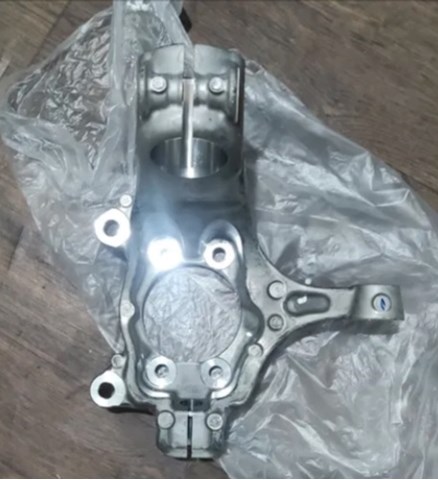 Купити 400145NA0A Nissan/Infiniti Кулак поворотний передній правий