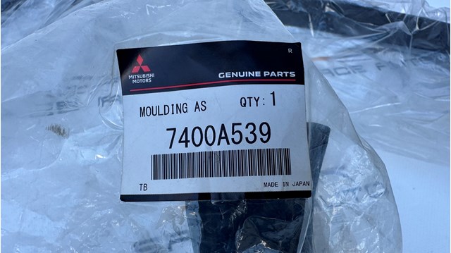 Купити 7400A539 Mitsubishi Молдинг арки колеса заднього, лівий