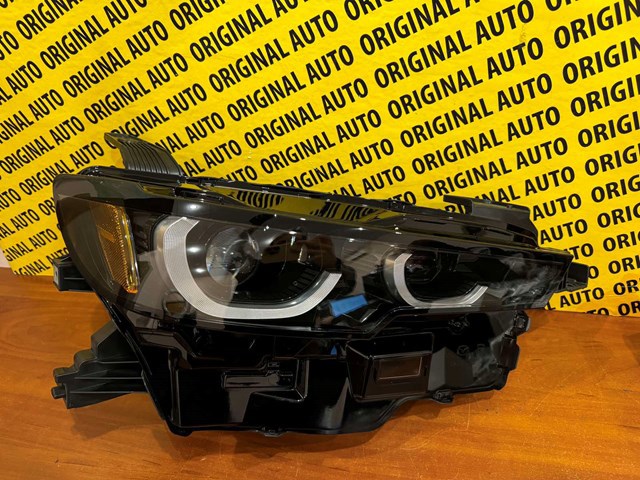 Фара передня права Mazda VA4051030B