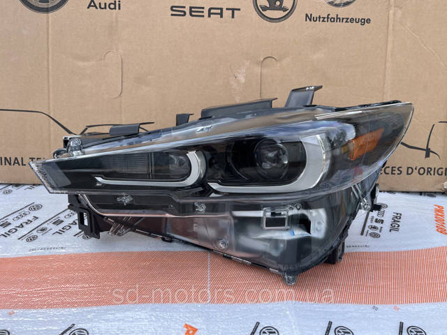 Купити KSD651040 Mazda Основна фара в зборі ліва