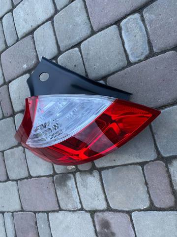 Задня ліва зовнішня фара Polcar 601487E ціна, від 66.37 USD