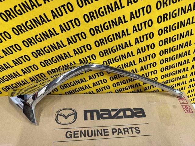 Купити D10J507K0C Mazda Молдинг переднього бампера, лівий