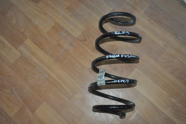 DG9C5310FNC Ford Пружина амортизатора передняя