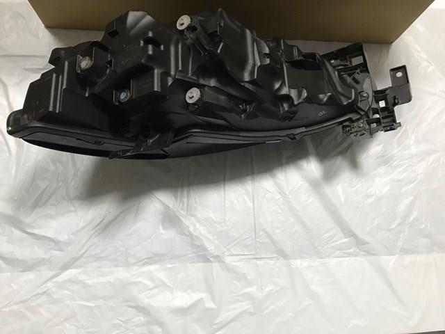 Фара передня права Mazda GSJ551031A