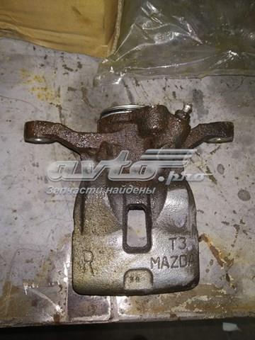 KAY02671XA Mazda Супорт гальмівний задній лівий