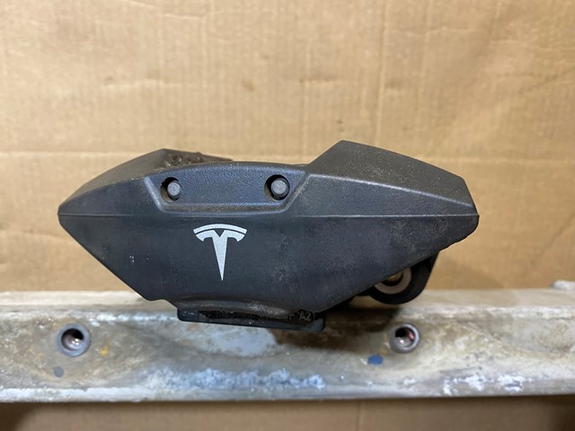Супорт гальмівний задній правий Tesla 102125200F