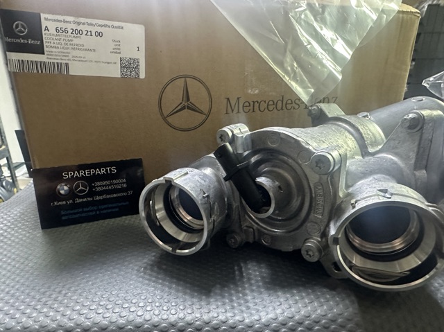 A6562002100 Mercedes Помпа водяна, (насос) охолодження, в зборі з корпусом
