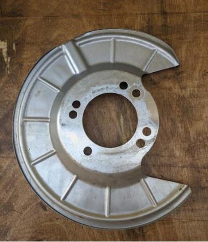 JX6Z2C028A Ford Захист гальмівного диска заднього, лівого