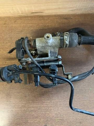 Фланець системи охолодження (трійник) Ford 1S7G8K556AJ ціна, від 25.66 USD
