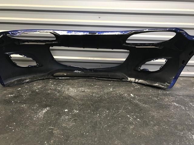 Передній бампер NH5250031 Mazda