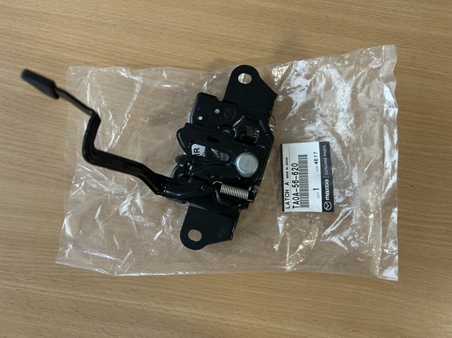 Замок капота Mazda TA0A56620 ціна, від 39.41 USD