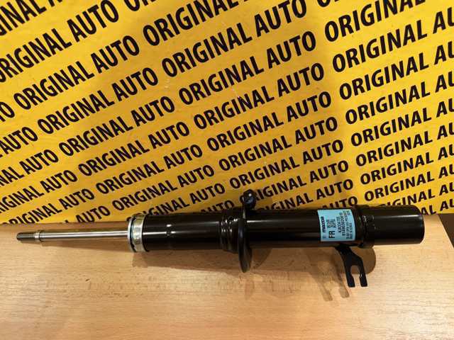 KJK334700 Mazda Амортизатор передньої підвіски