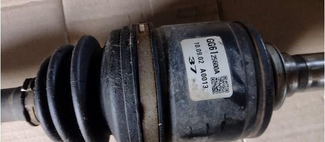 GG6125600A Mazda Привід лівий