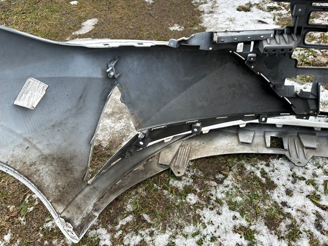 Переднє ікло бампера Hyundai/Kia 86511AA010