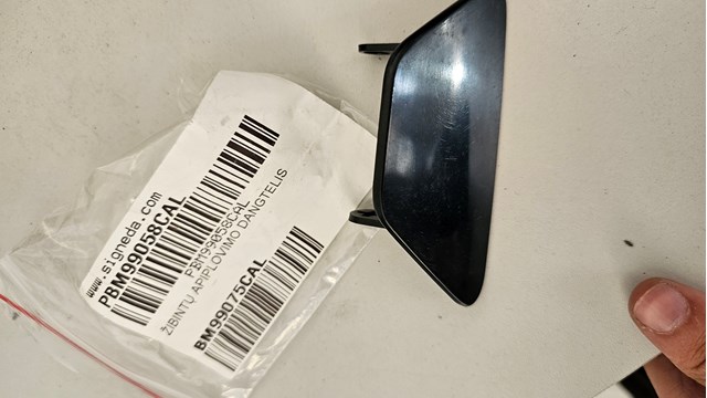 Накладка форсунки омивача фари передньої Signeda PBM99058CAL