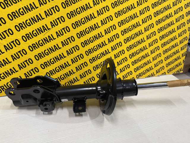 KB8M34900 Mazda Ліва передня стійка