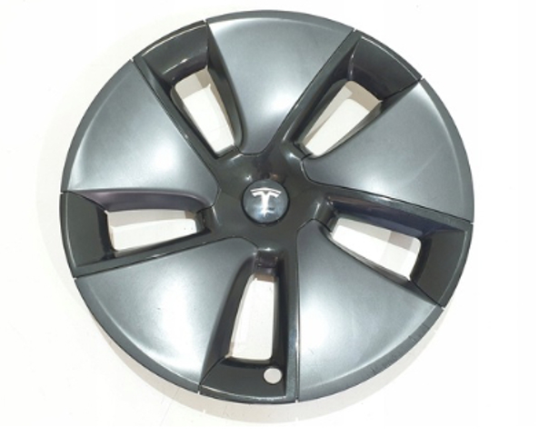 Ковпаки на диски Tesla 104427100A ціна, від 19.86 USD