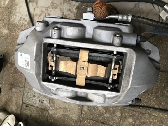 Супорт гальмівний передній правий Tesla 104462200D ціна, від 29.35 USD