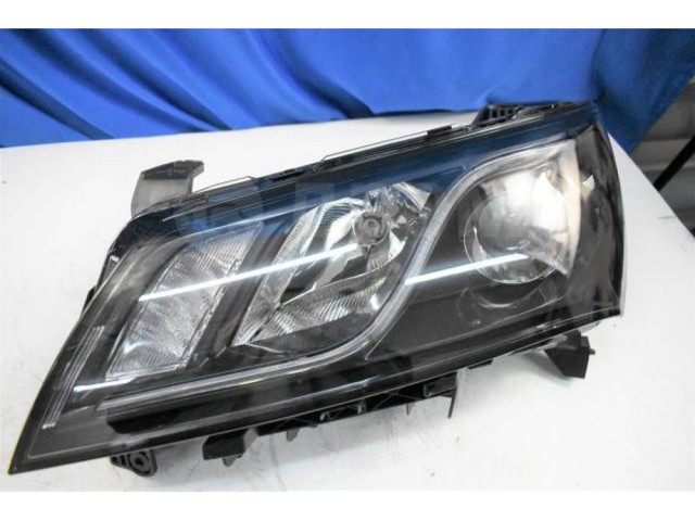 Фара ліва 1067004757 Geely