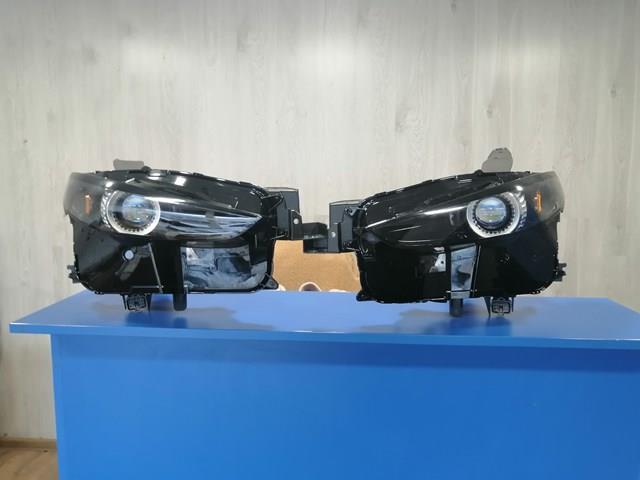 Фара ліва DGH951040A Mazda
