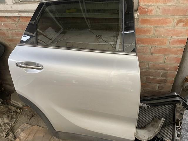 Купити 77004C6010 Hyundai/Kia Двері задні, праві