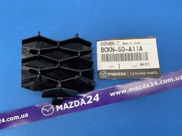 BCKN50A11A Mazda Заглушка бампера буксирувального гака, передня